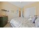 Cozy bedroom with a double closet, complemented by a side dresser and unique nautical decor at 195 Cupola Dr., Longs, SC 29568