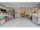 Spacious two-car garage with ample storage space and a workbench, ideal for DIY projects and organization at 195 Cupola Dr., Longs, SC 29568