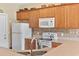 Well-appointed kitchen with stainless steel appliances, tile backsplash, and ample storage at 195 Cupola Dr., Longs, SC 29568