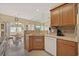 Kitchen features stainless steel sink and appliances with an open design connected to the living spaces at 195 Cupola Dr., Longs, SC 29568