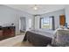 Comfortable bedroom with natural light, carpet and modern decor at 2090 Cross Gate Blvd. # 202, Surfside Beach, SC 29575