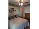 Bedroom featuring a bed, ceiling fan, and dresser at 22 Woodhaven Dr. # C, Murrells Inlet, SC 29576