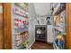 Walk-in pantry features shelving, wine refrigerator, and tile flooring at 221 Lander Dr., Conway, SC 29526