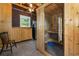 Features an indoor sauna, brick accent wall, cabinetry, and tiled flooring, perfect for a relaxing home spa experience at 221 Lander Dr., Conway, SC 29526