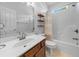 Clean, tiled bathroom with a single vanity, mirror, and shower/tub combo at 246 Laurel Bay Dr., Murrells Inlet, SC 29576