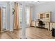 Versatile home office space with built-in desk and storage, natural light, and luxury vinyl plank flooring at 246 Laurel Bay Dr., Murrells Inlet, SC 29576