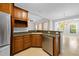 Kitchen with stainless steel appliances, cabinetry, and eat-in breakfast bar at 246 Laurel Bay Dr., Murrells Inlet, SC 29576