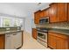 Modern kitchen with stainless steel appliances and stone countertops at 246 Laurel Bay Dr., Murrells Inlet, SC 29576