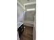 Bathroom features a soaking tub with tiled shower, a vanity with a dark wood cabinet, and wood-look flooring at 25 Pinewood Dr., Carolina Shores, SC 28467