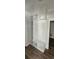 Mudroom with custom built-in shelving, storage bench, and shiplap accent wall, enhancing organization at 25 Pinewood Dr., Carolina Shores, SC 28467