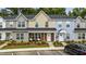 Charming townhomes feature colorful exteriors, landscaped front yards, and convenient parking in front at 2728 Mercer Dr. # 2728, Conway, SC 29526