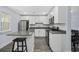 Bright kitchen features modern appliances, granite countertops, a stylish island, and ample cabinet space at 2728 Mercer Dr. # 2728, Conway, SC 29526