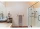 Bathroom featuring glass-enclosed shower, granite countertop, and modern fixtures at 276 Waterfall Circle, Little River, SC 29566