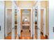 Elegant bathroom with a soaking tub and mirrors reflecting the tub at 276 Waterfall Circle, Little River, SC 29566