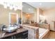 Bathroom with a large mirror, vessel sink, and a separate shower and tub at 276 Waterfall Circle, Little River, SC 29566