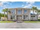 Elegant building featuring grand pillars, decorative windows and lush landscaping at 276 Waterfall Circle, Little River, SC 29566