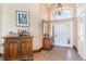 Grand foyer with tile flooring, chandelier, and a view of the front door at 276 Waterfall Circle, Little River, SC 29566