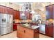 Spacious kitchen featuring a center island, ample cabinet space, and stainless steel appliances at 276 Waterfall Circle, Little River, SC 29566