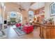 Bright living room with high ceilings, large windows, and stylish furnishings at 276 Waterfall Circle, Little River, SC 29566