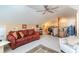 Relaxing living room with a comfortable sofa and a view of the open concept office area at 276 Waterfall Circle, Little River, SC 29566