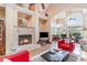 Cozy living room featuring a fireplace, tile floors, and comfortable seating at 276 Waterfall Circle, Little River, SC 29566