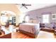 Spacious bedroom with hardwood floors, a ceiling fan, and a connected office space at 276 Waterfall Circle, Little River, SC 29566