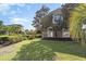 Well maintained lawn around a brick home with mature landscaping at 276 Waterfall Circle, Little River, SC 29566