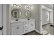 Modern bathroom featuring double sinks, white cabinets, and sleek fixtures, perfect for a contemporary lifestyle at 2919 Hughes Gasque Rd., Aynor, SC 29511
