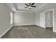 Bright bedroom featuring hardwood floors, a ceiling fan, and a window for natural light at 2919 Hughes Gasque Rd., Aynor, SC 29511