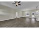 Bright living room with an open layout that flows seamlessly into a modern kitchen with stainless appliances at 2919 Hughes Gasque Rd., Aynor, SC 29511