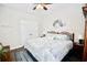 Spare bedroom with queen bed, ceiling fan, hard wood floors and furniture at 3024 Calusa Dr., Little River, SC 29566