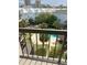 Aerial view of a complex featuring a swimming pool, lounge chairs, and manicured landscaping at 310 N 73Rd Ave. N # 5D, Myrtle Beach, SC 29572