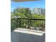 Scenic balcony view showcases lush greenery and the city skyline beyond at 310 N 73Rd Ave. N # 5D, Myrtle Beach, SC 29572