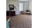 Cozy living area features traditional furnishings, neutral colors, and abundant natural light at 310 N 73Rd Ave. N # 5D, Myrtle Beach, SC 29572
