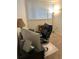 A tidy office features a modern computer setup, comfortable chair, and soft, filtered natural light through blinds at 310 N 73Rd Ave. N # 5D, Myrtle Beach, SC 29572