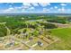 An aerial shot showing the community, surrounding landscape and water features at 3117 Chapel Rd., Loris, SC 29569