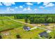 Aerial view of the property showcasing its location and surrounding landscape in a rural setting at 3117 Chapel Rd., Loris, SC 29569