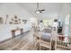 Open living space featuring living room, dining area, and glimpses of the kitchen, ideal for entertaining and Gathering gatherings at 3117 Chapel Rd., Loris, SC 29569