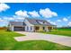 Lovely home featuring an attached garage and a long driveway leading up to the property at 3117 Chapel Rd., Loris, SC 29569
