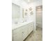 Bright bathroom featuring a double sink vanity, decorative turtles, and a shower-tub combo at 3300 Bay View Ct., North Myrtle Beach, SC 29582
