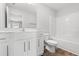 Clean bathroom featuring a white vanity, toilet, and shower-tub combination at 3324 Little Bay Dr., Conway, SC 29526