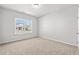 Bedroom featuring neutral colored carpet and a window with a view to a neighboring homes under construction at 3324 Little Bay Dr., Conway, SC 29526