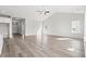 Spacious living room boasts wood floors, vaulted ceiling and a view of the hallway at 3324 Little Bay Dr., Conway, SC 29526
