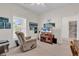Bright room with window, golf decor, and comfortable recliner seating at 339 Black Oak Ln. # 201, Murrells Inlet, SC 29576