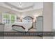Spacious main bedroom with tray ceiling and large windows with views at 339 Black Oak Ln. # 201, Murrells Inlet, SC 29576