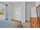 Bright bedroom featuring a storage chest at the foot of the bed and wooden dresser at 366 Fennec Loop, Conway, SC 29526