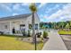 Enjoy the community pool with a shaded pavilion, lounge chairs, and a palm tree at 366 Fennec Loop, Conway, SC 29526