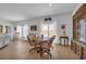 Inviting dining area with a round table, views to the pond, and plenty of natural light at 366 Fennec Loop, Conway, SC 29526