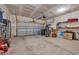 Spacious garage with ample storage space and a large garage door at 366 Fennec Loop, Conway, SC 29526