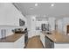 Open kitchen featuring a large island, stainless steel appliances, and ample counter space at 366 Fennec Loop, Conway, SC 29526